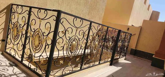 دهان ابواب حديد وخشب ناري وزيتي 5