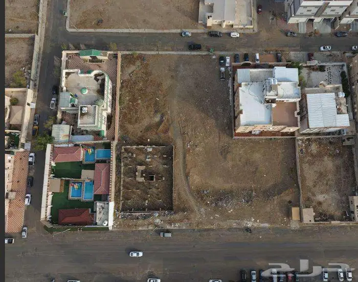 ارض مستوية مناسبة للمستثمرين في حي النوارية 0