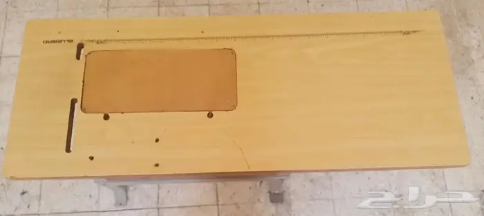 طاولة مكينة خياطة مستعملة 1