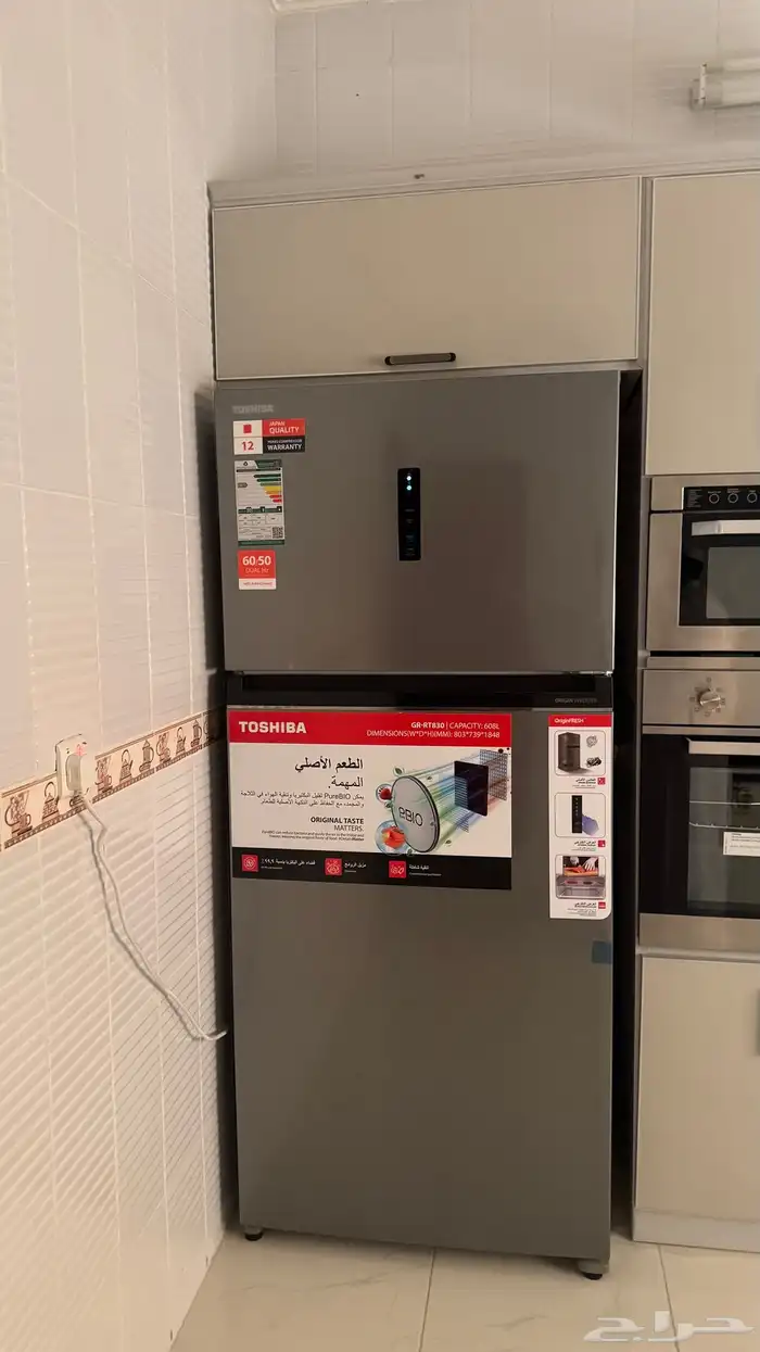 مطبخ ومعه الأجهزة 5