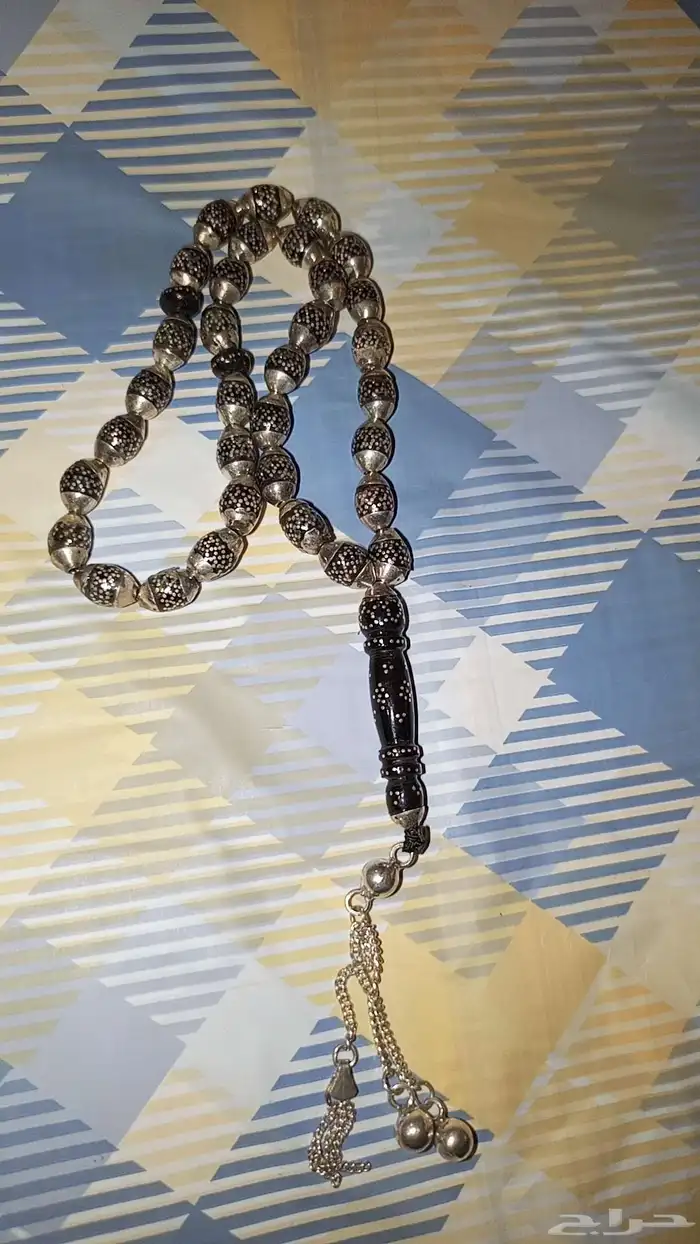 ملكية سبحة يسر بحر احمر ملبسة بالكامل بالفضة عدد الخرزات 33 1