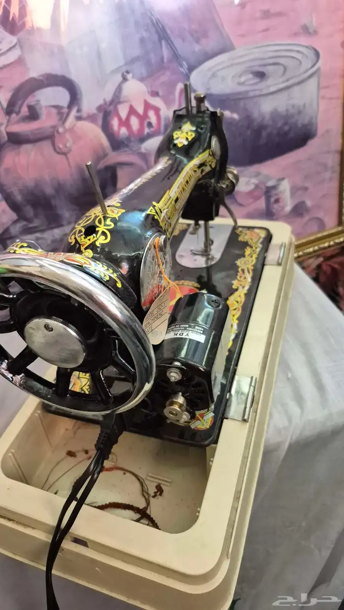 مكينه خياطه 8
