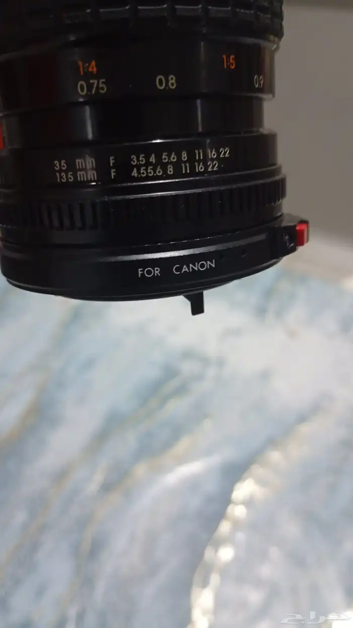 عدسة كانون 0