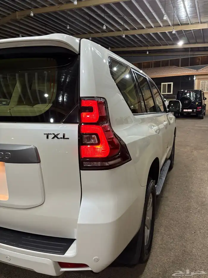 للبيع برادو TXL 2023 أبيض 6 سرندل (ممشى 1450 KM )وكاله نادر 5
