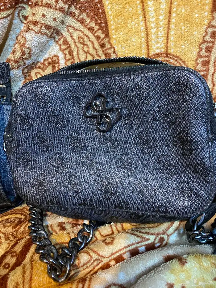 محفظة نقود و حقائب كتف اصليه من GUESS 5