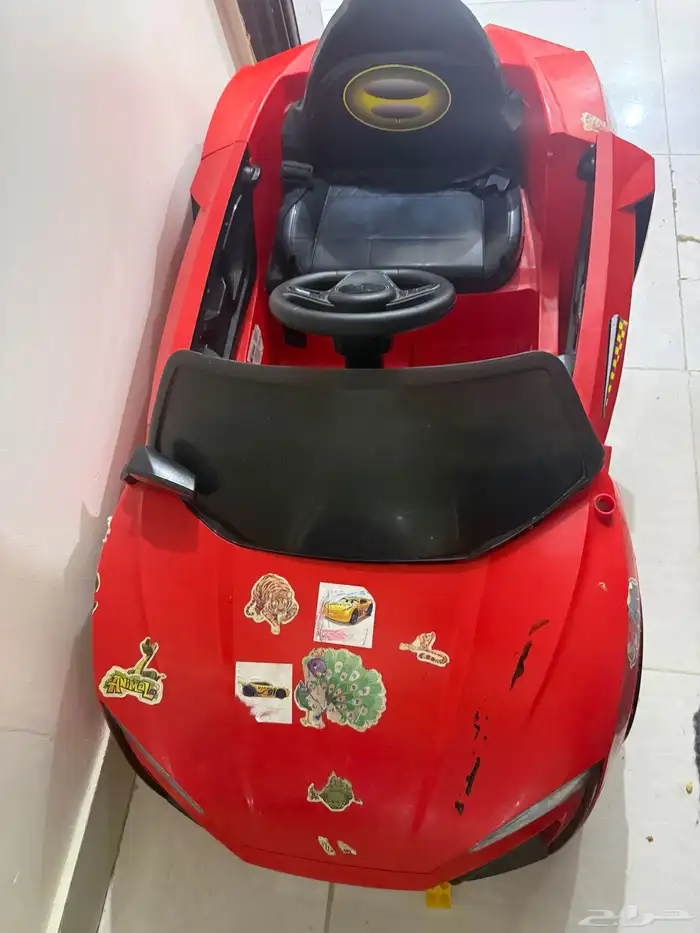 عربه اطفال معاها الشاحن والريموت للبيع بحاله جيده 1