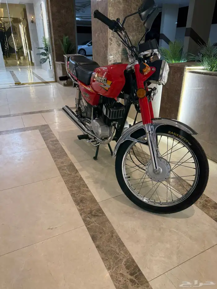 دباب سوزوكي AX100 3