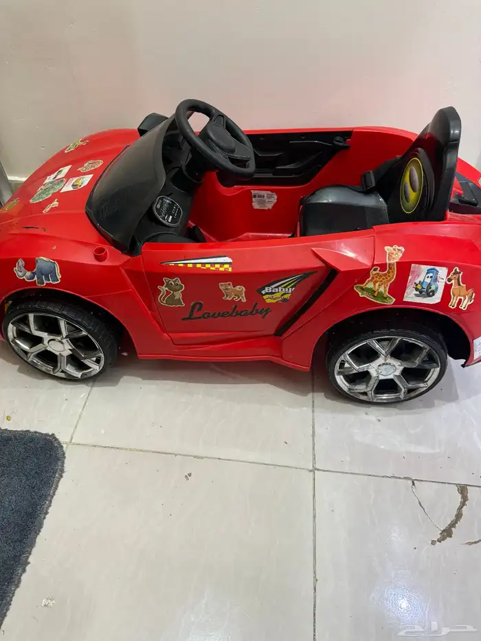 عربه اطفال معاها الشاحن والريموت للبيع بحاله جيده 2