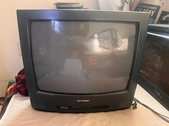 ثلاجة و غسالة و تلفزيون و بوتوجاز للبيع 9