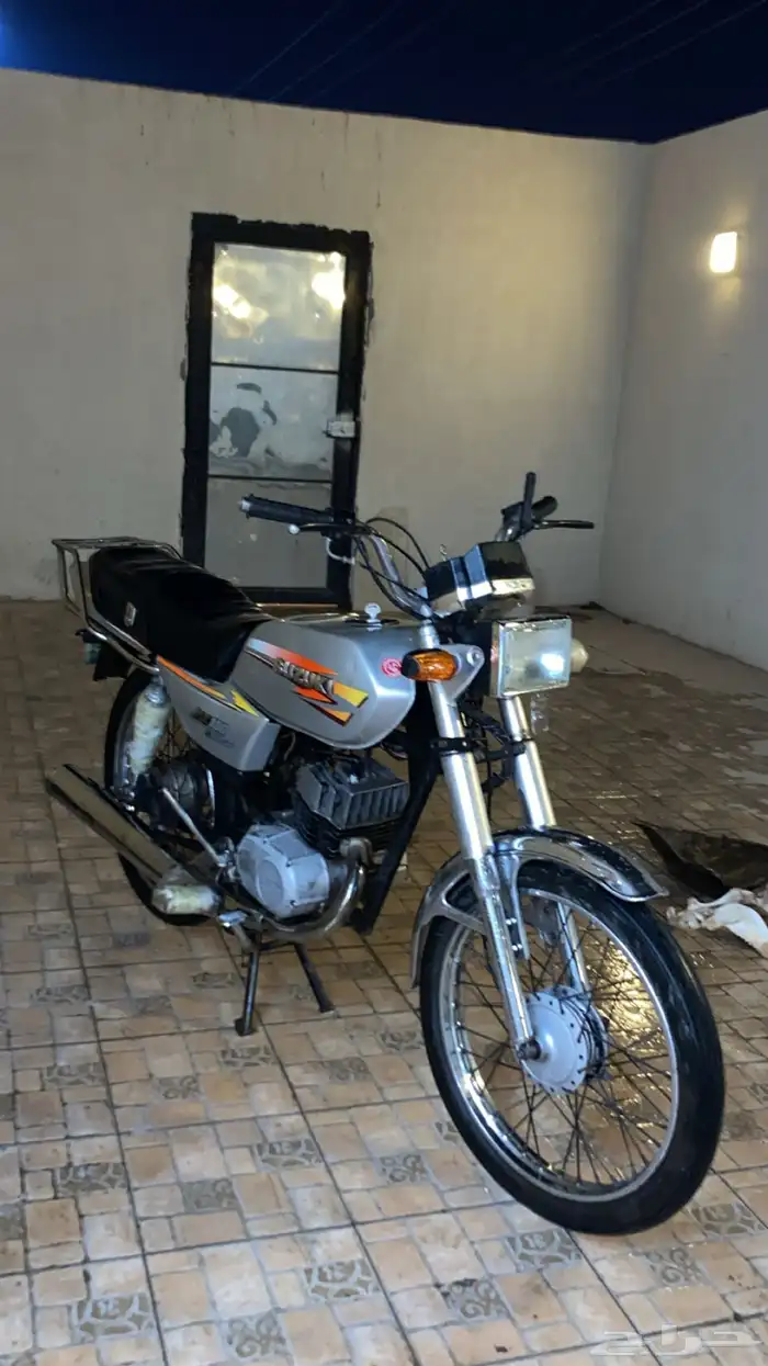 Suzuki Ax100 0