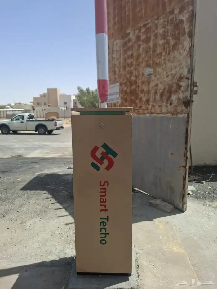 ذراع بوابة مواقف سيارات مقص بالكرت والربموت تركيب وصيانه 1