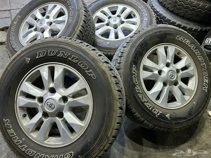 كفرات دنلوب مقاس 275 65 17 مع جنوط اصلي جيب لاند كروزر 0