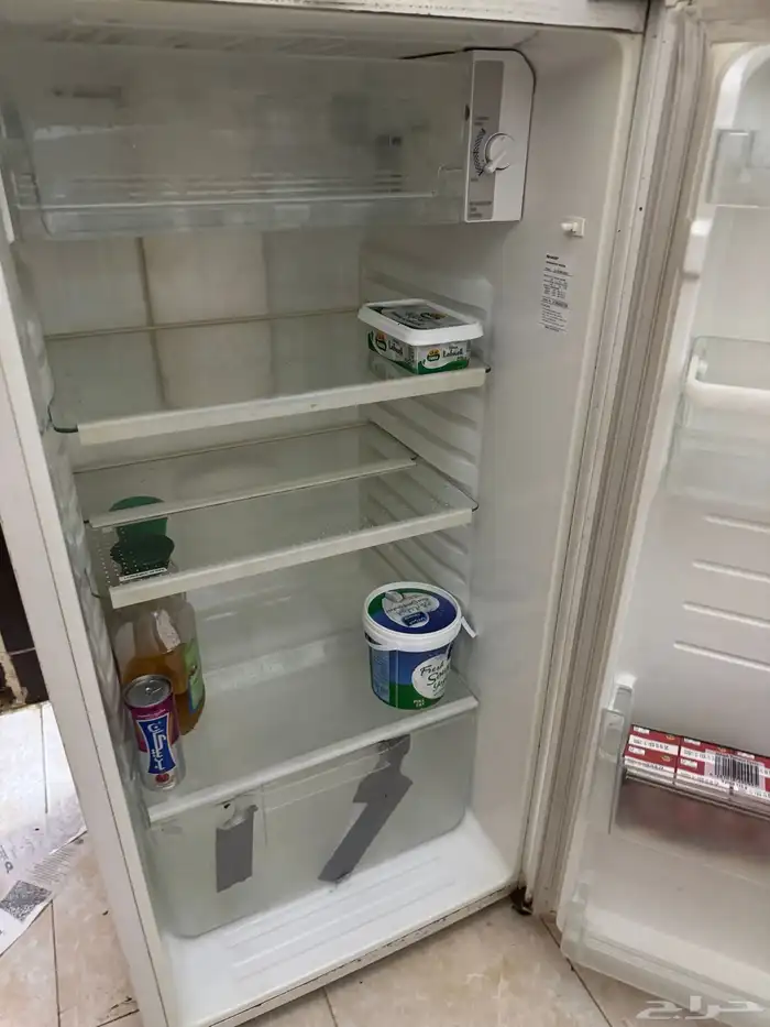 غسالة وثلاجة وبوتغاز ومكيف وطقم كنب 7