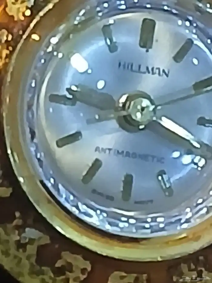 ساعة يابانية قديمة وساعة سويسرية 14