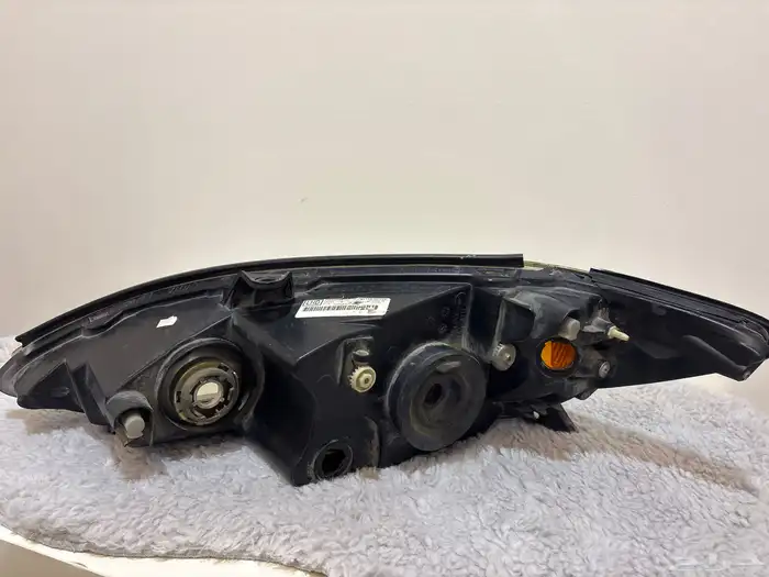 شمعة امامي يسار كامري 2003-2004 2