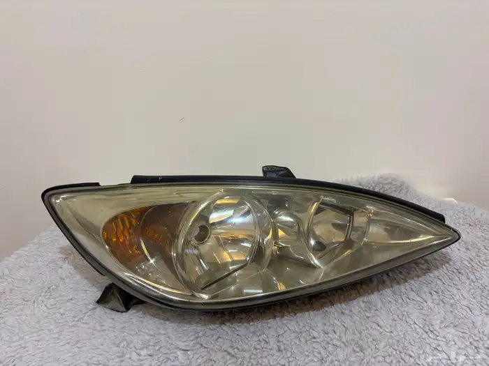 شمعة امامي يسار كامري 2003-2004 0