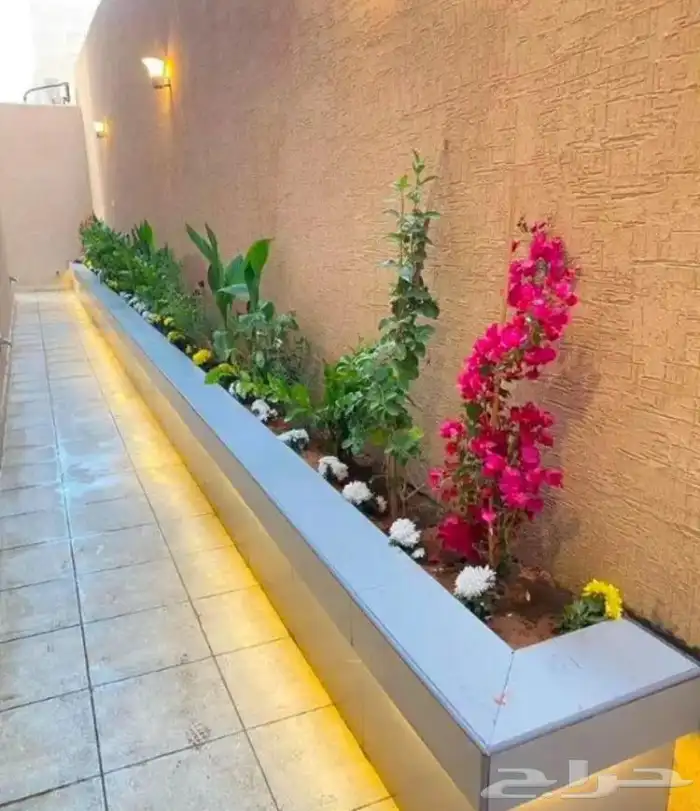 تنسيق الحدائق المنزلية وتركيب العشب الصناعي 2