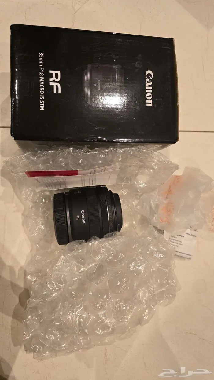 عدسات كانون RF100 macro و RF35 2