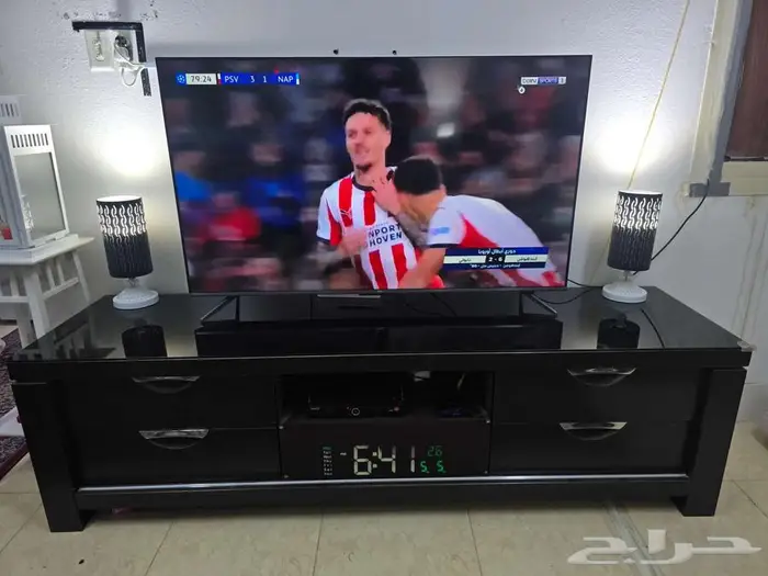 طاولة تلفاز مع عازل زجاجي  تلفاز 55بوصه 2ابوجوره 1