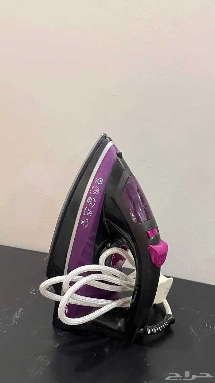 مكواة ملابس 0