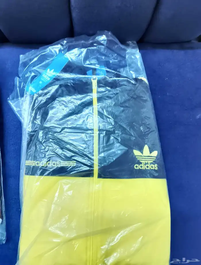 ترينق رياضي اصفر ماركه اديداس أصلي 1