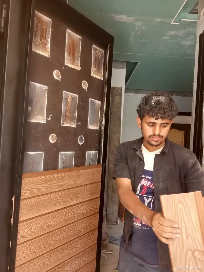 مظلات وصيانة ابواب وبديل خشب 3