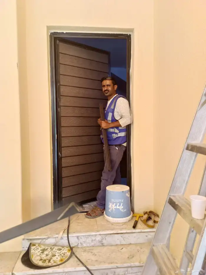 مظلات وصيانة ابواب وبديل خشب 4