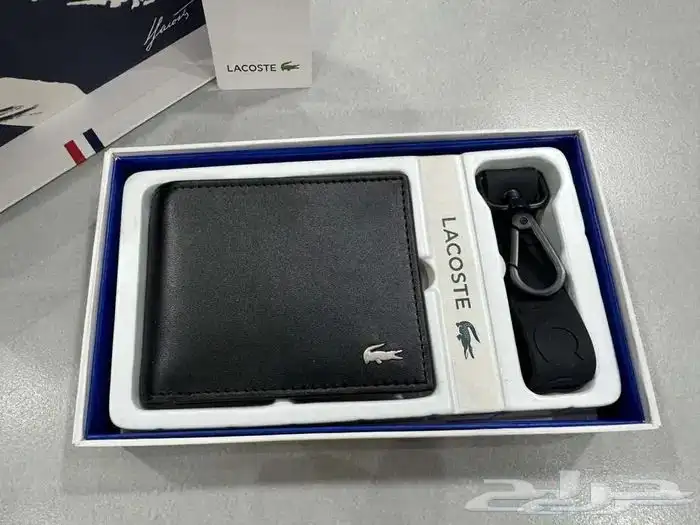 محفظة لاكوست LACOSTE مع ميدالية جديدة 2