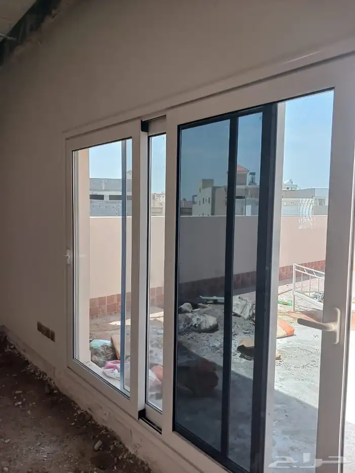 أعمال المنيوم شبابيك وأبواب ووجهات زجاجيه 0