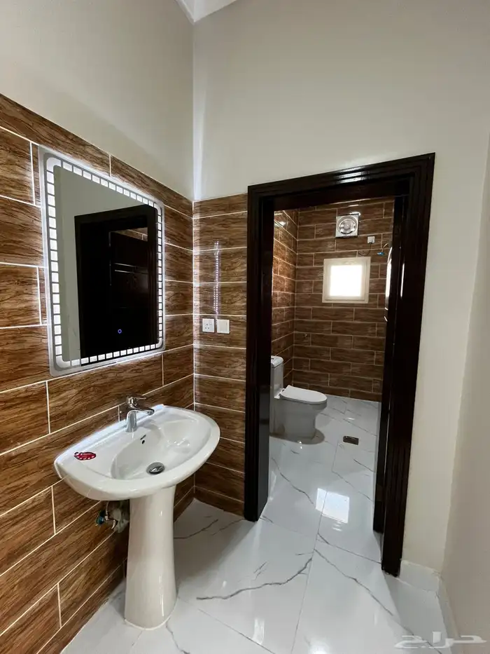 شقة حي الدانة 3 دور ارضي جديدة 13