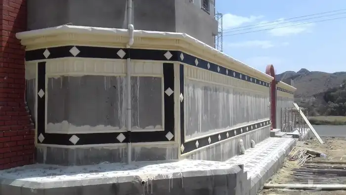 معلم ديكورات خارجيه مع اسمنت بديل الحجر 2