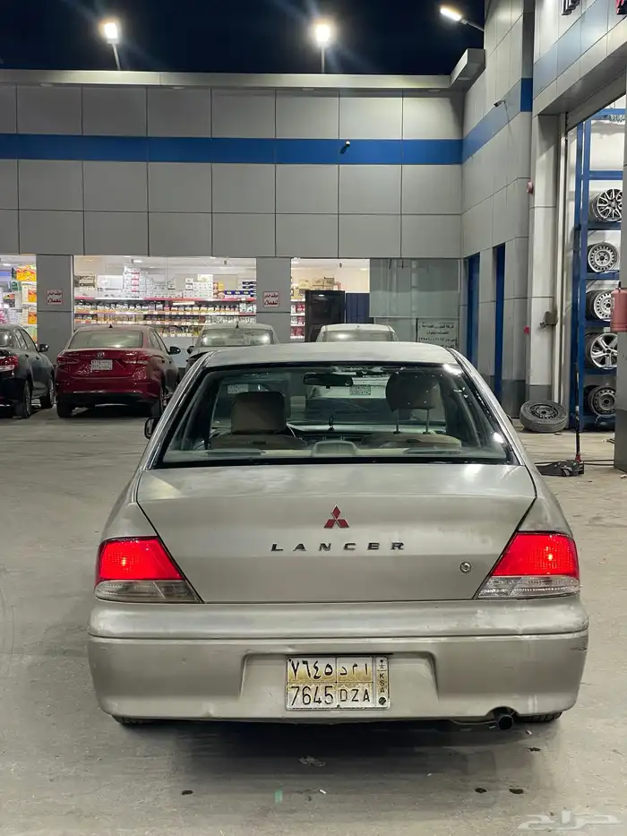 لانسر ميتسوبيشي 2003 بومه 3