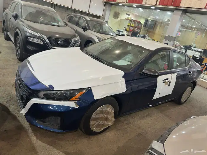 نيسان التيما S استندر 2024 اسود رصاصي ازرق عرض خاص 12