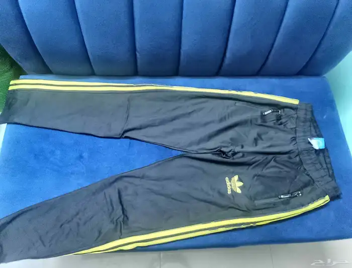 ترينق رياضي اصفر ماركه اديداس أصلي 2