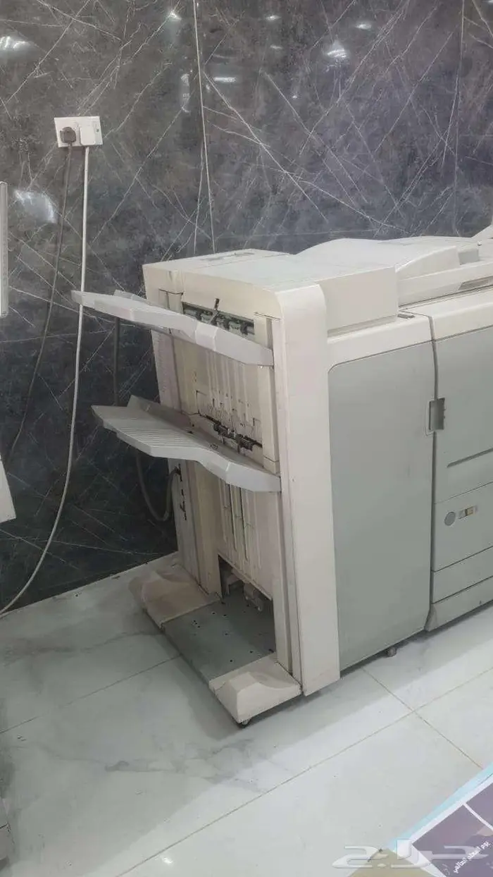 اله تصوير كانون 7105 1