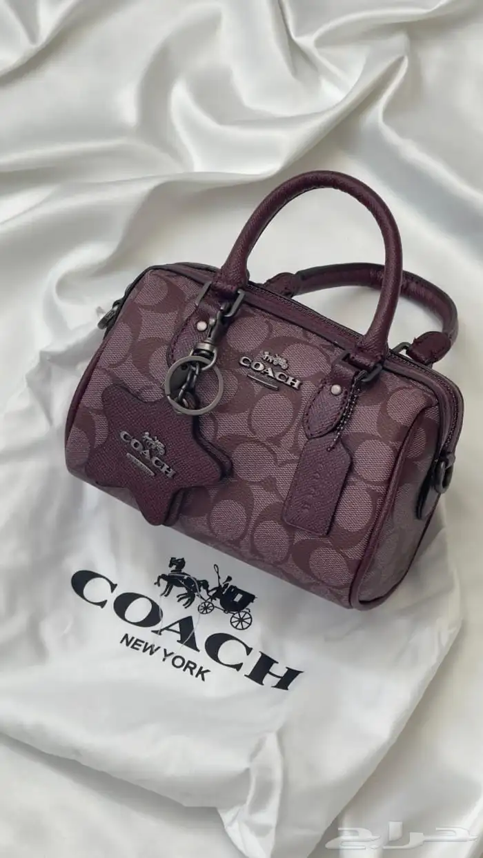 شنط كوتش عنابي الهبه 1