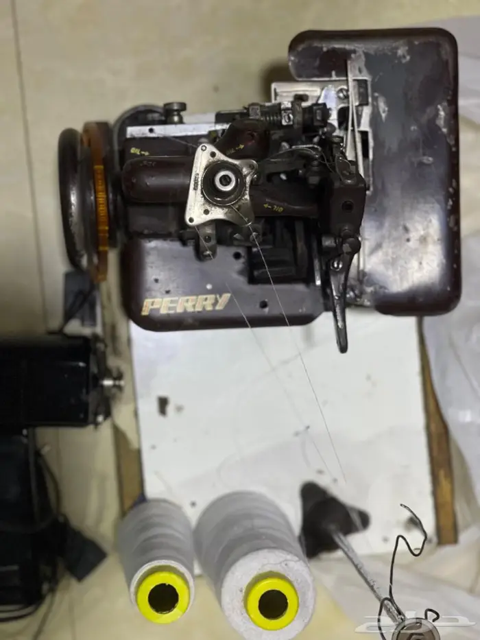 مكينه خياطه اوفر لوك شركة PERRY 1