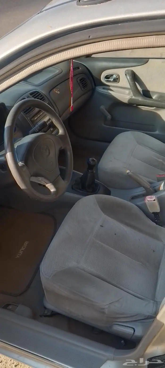 ماذدا 323 0 جير عادي زجاج عادي مجدد مفحوص 1