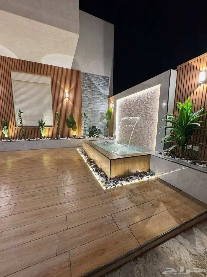 عشب وديكورات وشلالات وغرفة قزاز 12