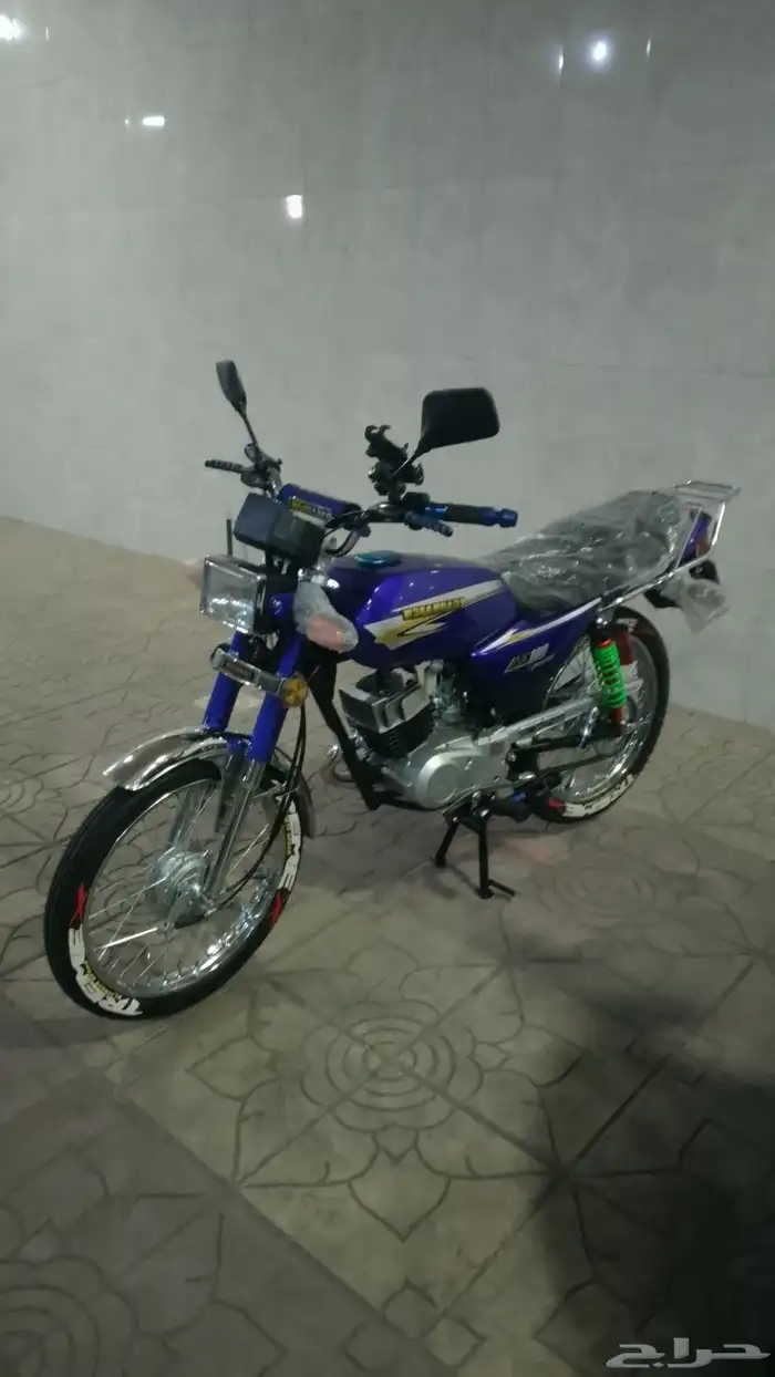 أكس 100 وسام ناري أزرق 2026 محول سوزوكي 14