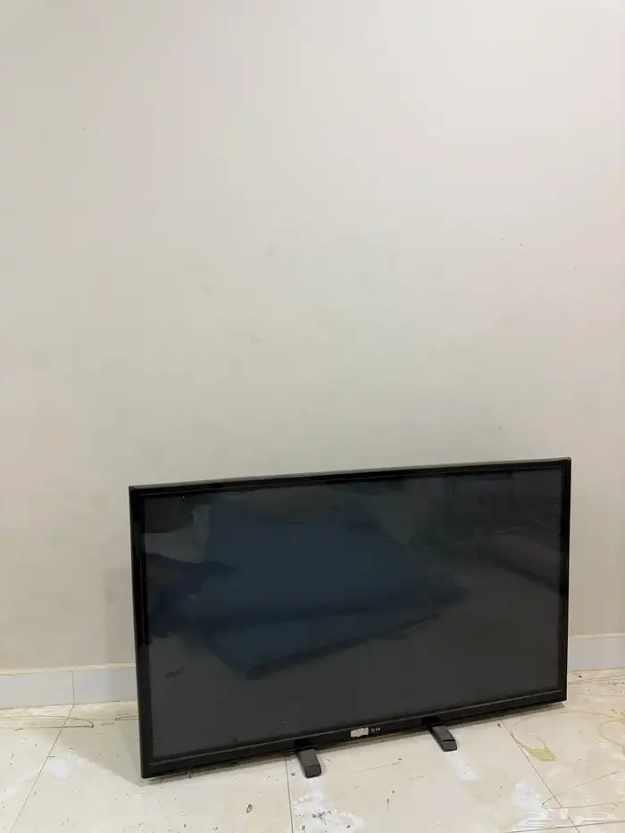 شاشة LG مع ريموتها مع حهاز شاومي للأفلام والمسلسلات 0