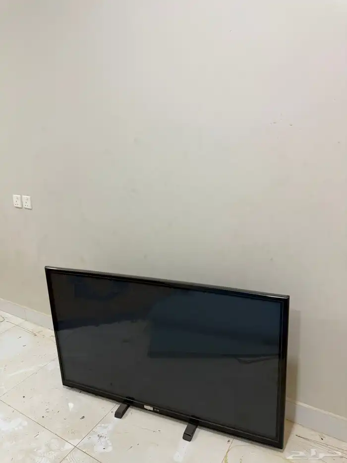 شاشة LG مع ريموتها مع حهاز شاومي للأفلام والمسلسلات 3