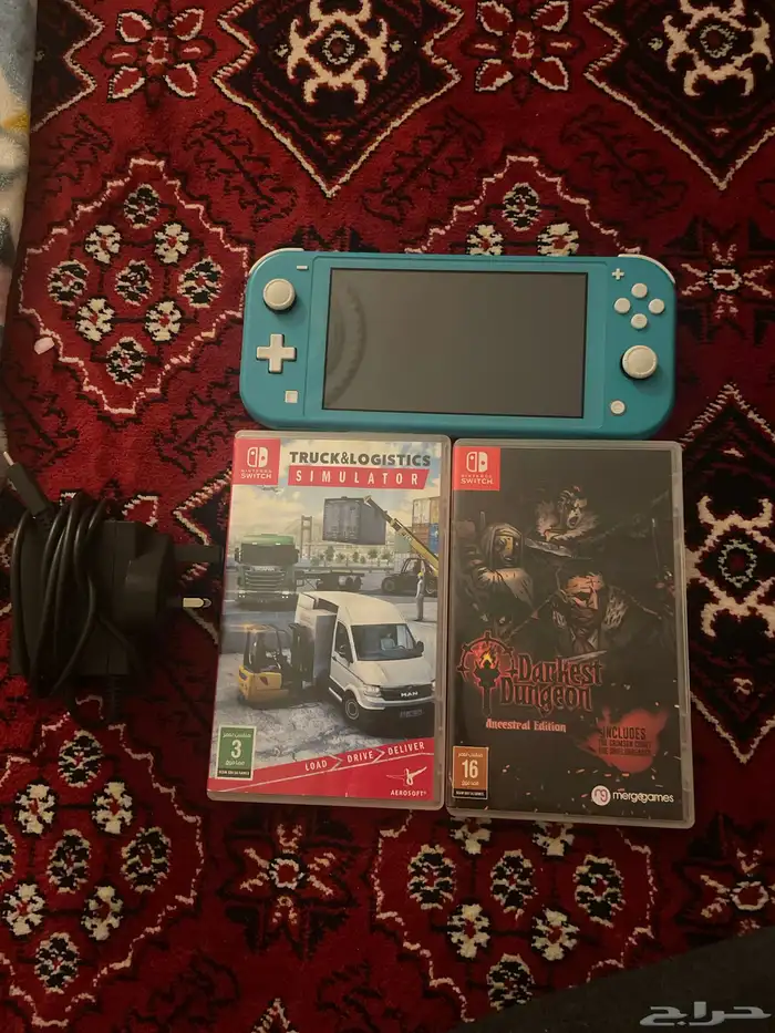 نينتيندو سويتش لايت باللون السماوي و الابيض 0