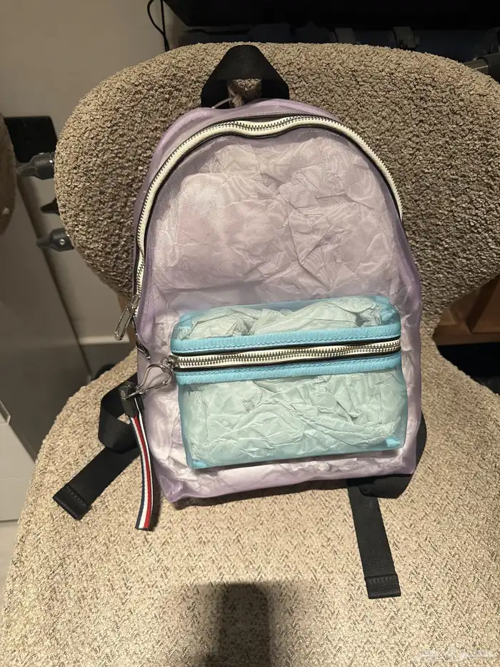 شنطة تومي اصليه وجديدة بالتاق حقها (شفافه) 0