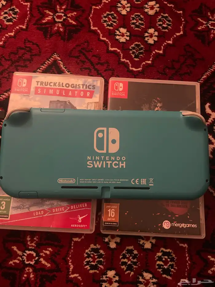 نينتيندو سويتش لايت باللون السماوي و الابيض 1