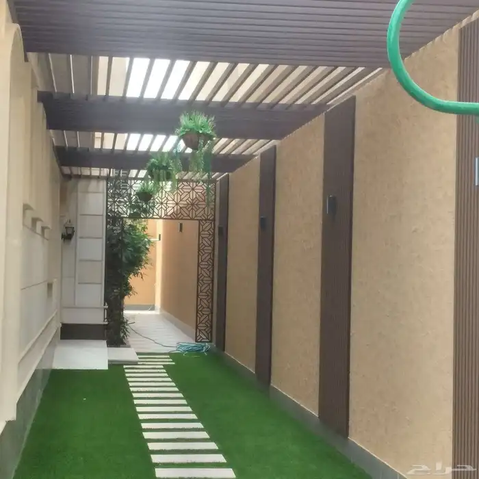 عشب وديكورات وشلالات وغرفة قزاز 6