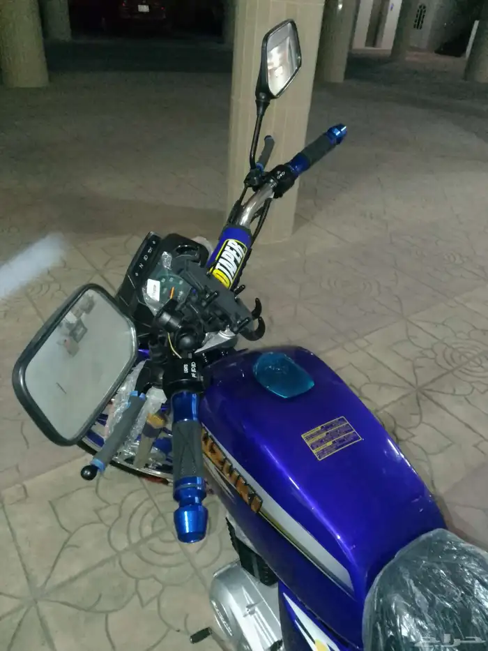 أكس 100 وسام ناري أزرق 2026 محول سوزوكي 4