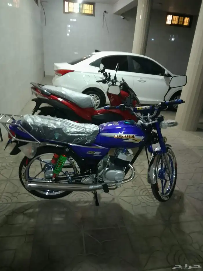 أكس 100 وسام ناري أزرق 2026 محول سوزوكي 12