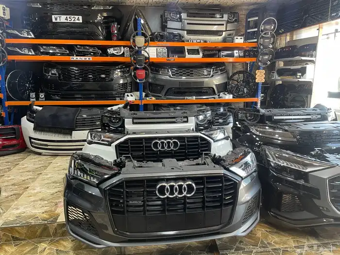 قطع غيار مستورد اودي وبورش بجميع فئاتها مع الضمان 12