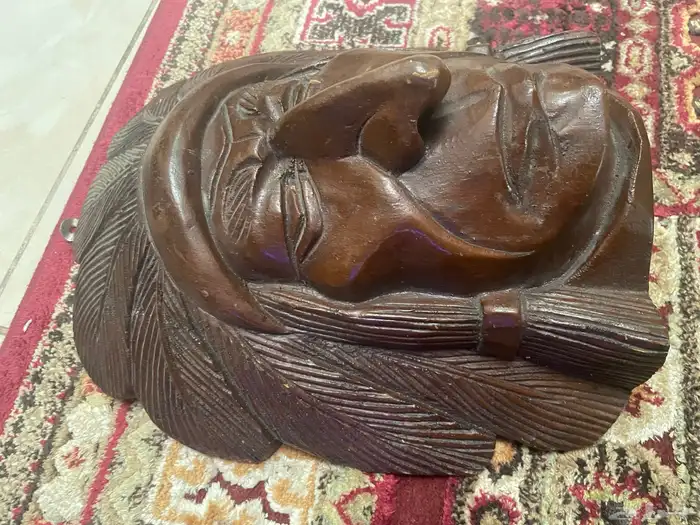 A wooden craved head راس خشبي منحوت 8